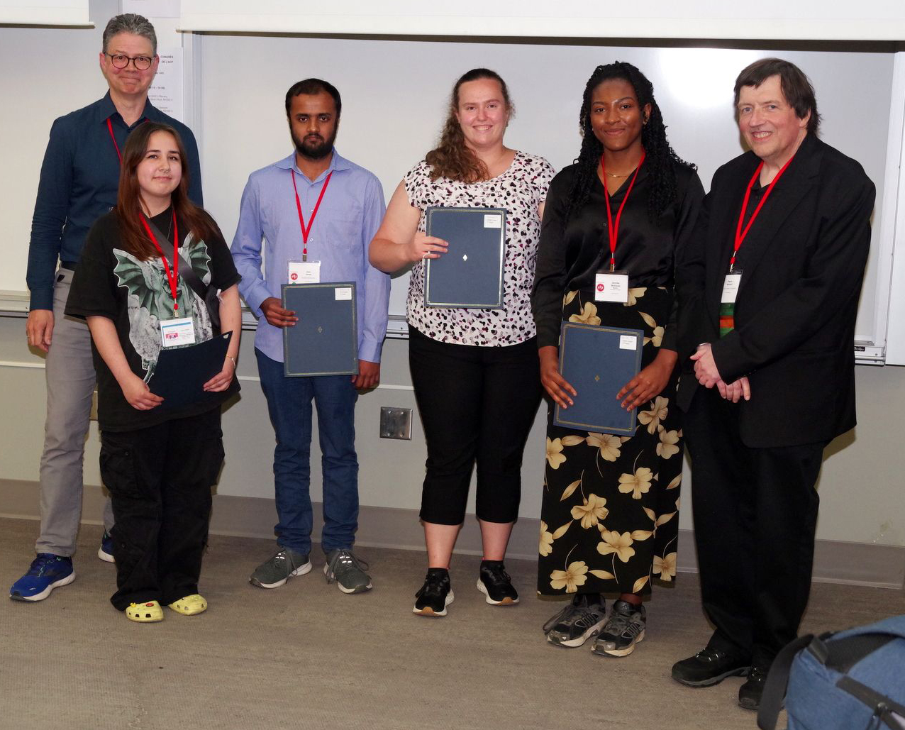 Image of BSPC poster competition finalists with Bill Whelan, CAP's Past-President, and Pierre Bénard, CAP's Vice-President-Elect.
